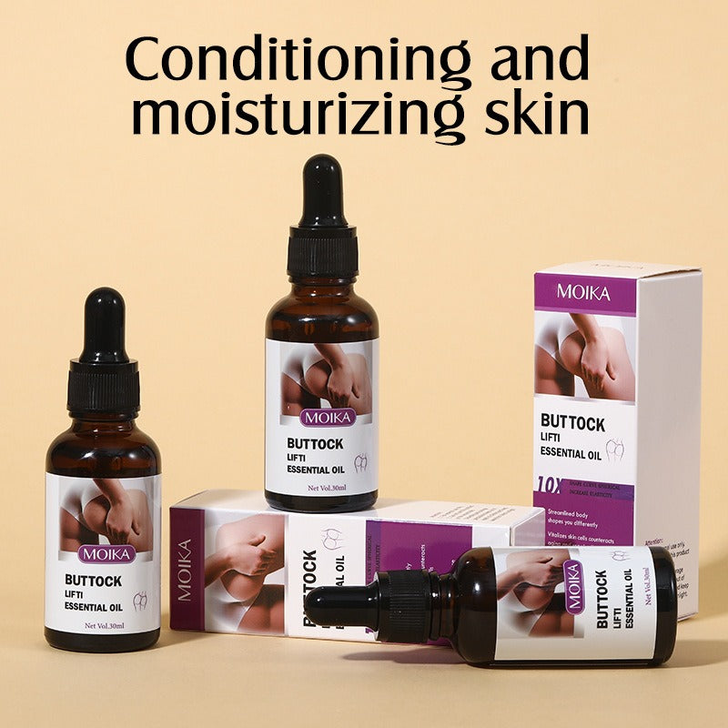Three amber glass dropper bottles and three matching product boxes for MOIKA Buttock Lift Essential Oil are arranged on a beige background with the text 'Conditioning and moisturizing skin' above them.
