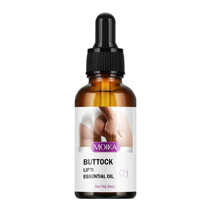 An amber glass dropper bottle of MOIKA Buttock Lift Essential Oil with a black dropper cap and a white label featuring a photo of a buttock.